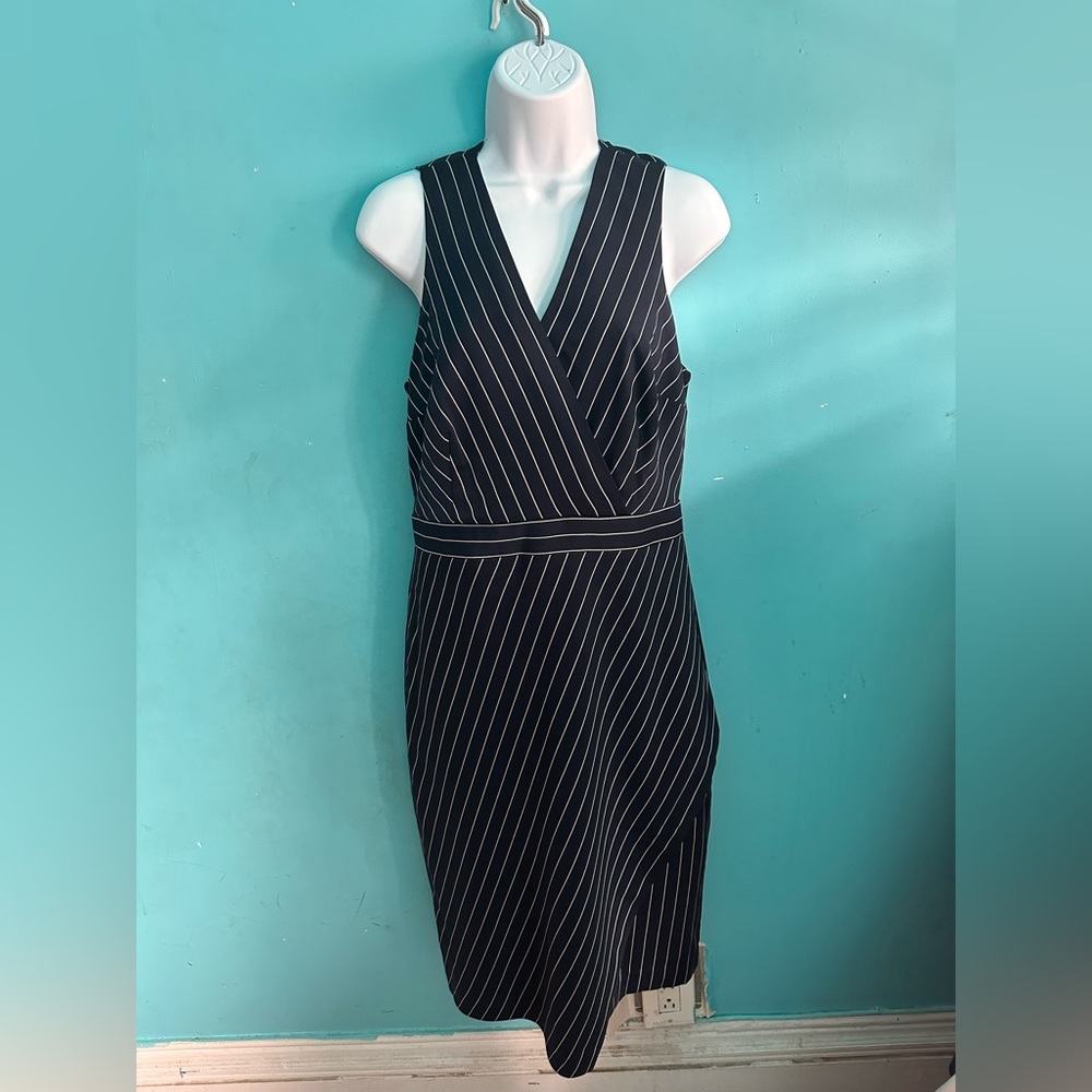 Navy blue with white pinstripe v-neck